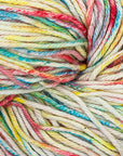 A close-up image of a multicolored worsted weight yarn skein with vibrant splashes of red, blue, and yellow
