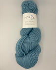Blue skein of yarn with a Pickles label on a white background
