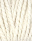 Close-up of beige yarn on a white background