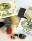 Green Cottage felting kit with yarn balls and bird figures on a white background