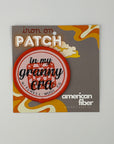 Scout Patch on packaging with 'American Fiber' branding on a gray background