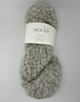 Gray skein of boucle yarn with a Pickles label on a white background