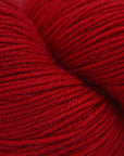 A swatch of red Cascade Heritage yarn.