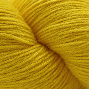 A swatch of yellow Cascade Heritage yarn.
