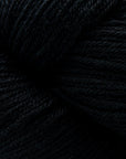 A black swatch of Cascade Heritage yarn
