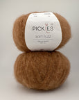 Two balls of brown yarn with a Pickles label on a light gray background