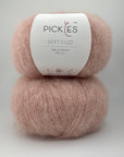 Two skeins of pink yarn with a Pickles label on a white background
