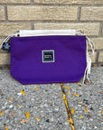 Mitchell Wool purple bag with a brand label on a pavement